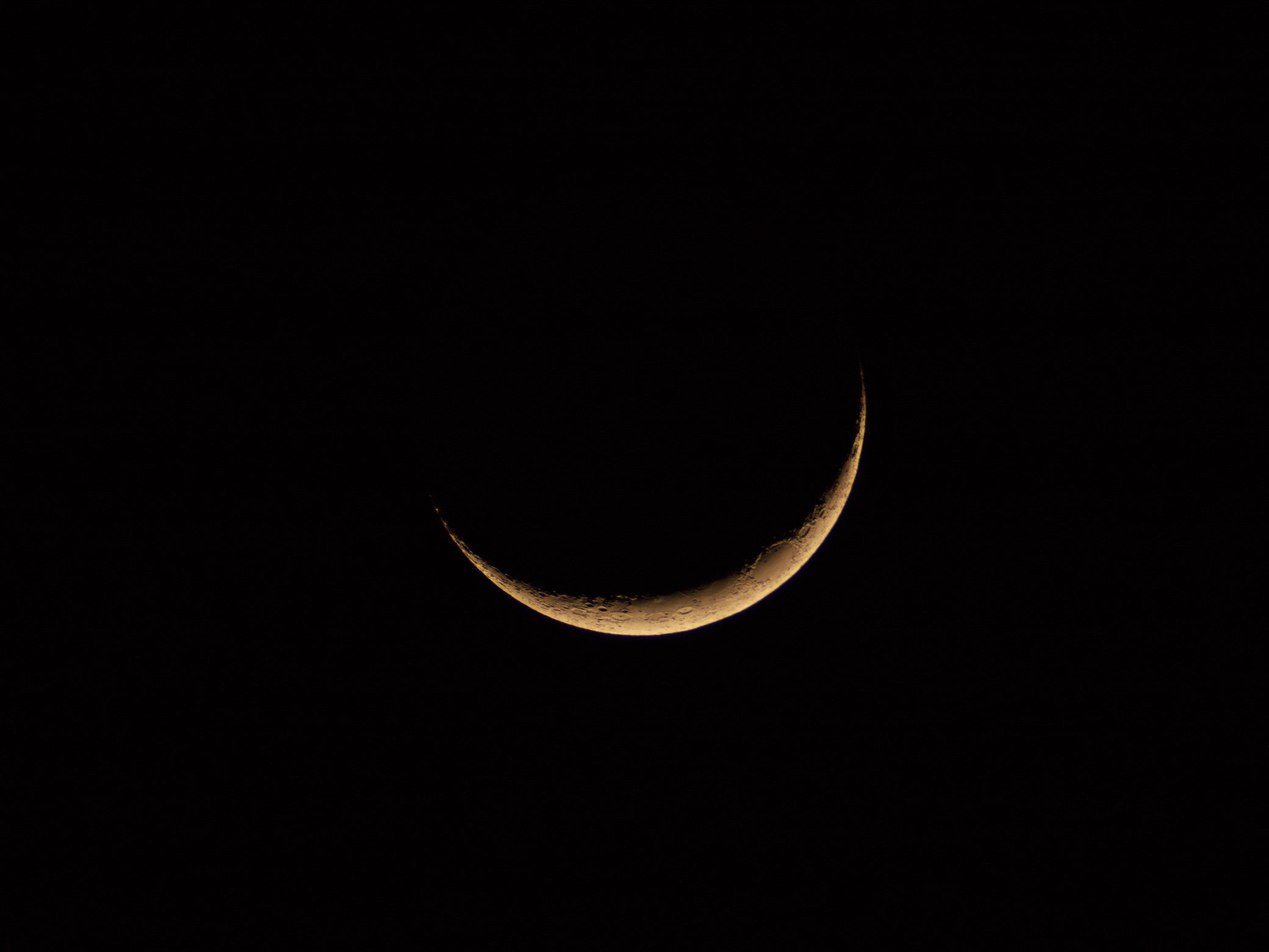 A Crescent Moon on the Dark Sky